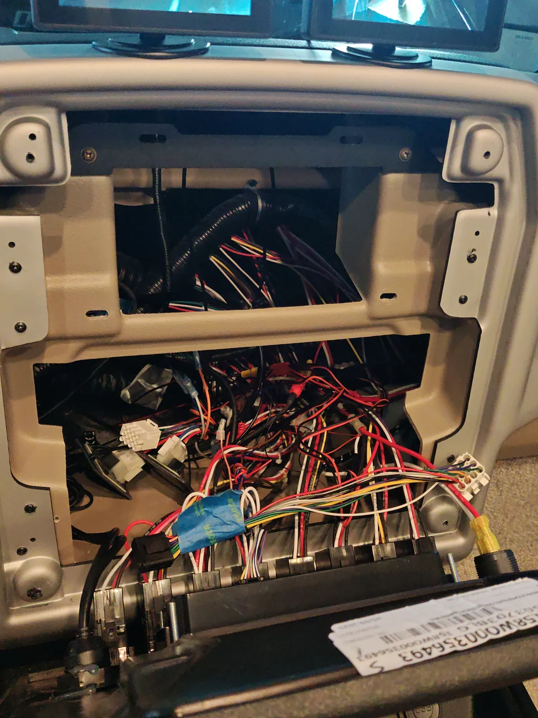 Tiffin dashboard with the Garmin removed and the wiring exposed