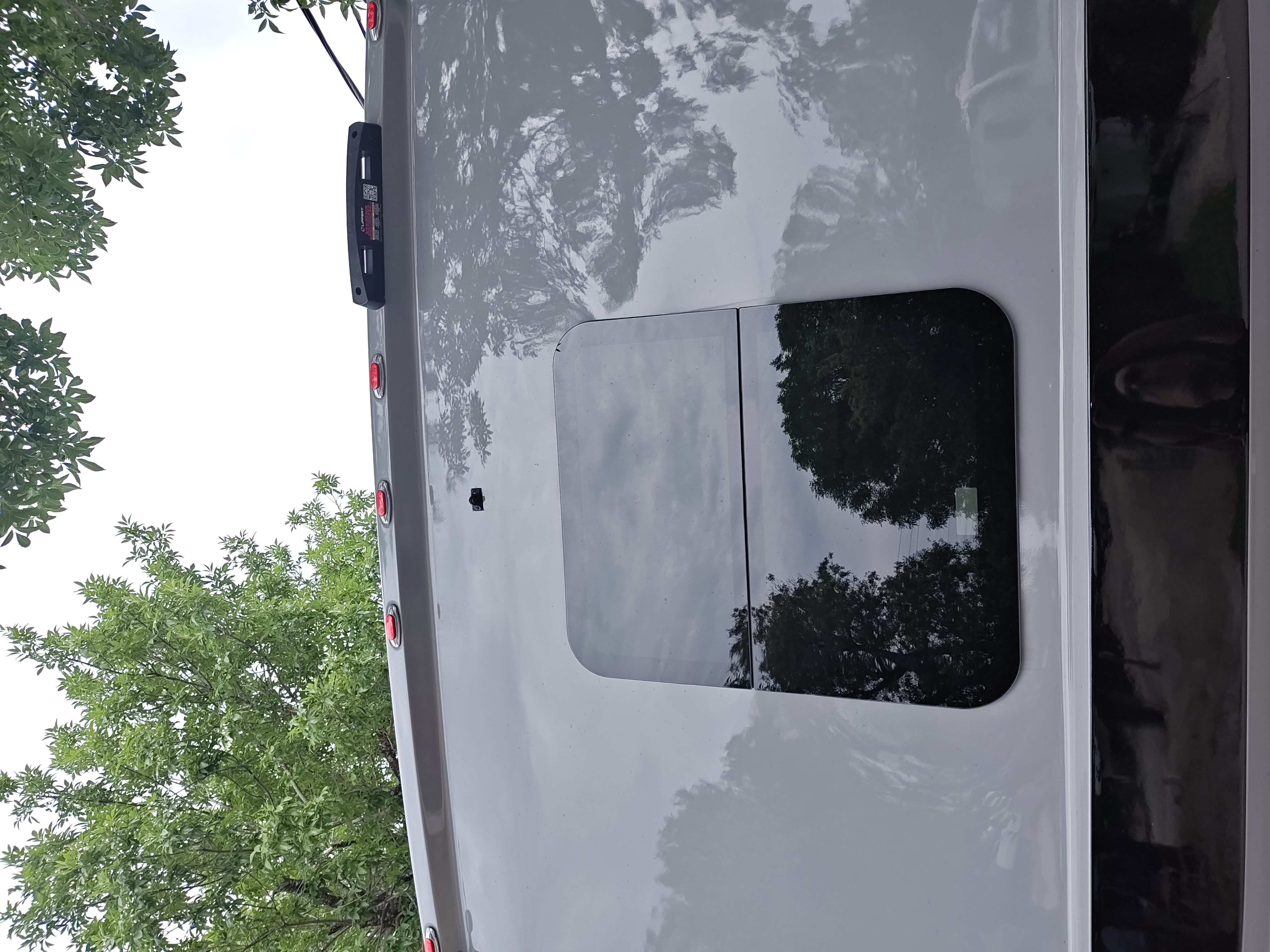 Rear of the Tiffin showing the camera location and center upper marker light