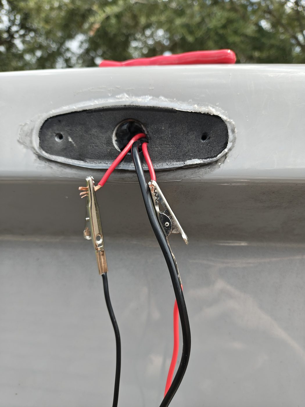 Center upper marker light removed with the running-light wiring exposed